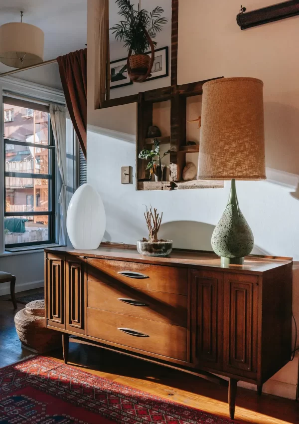 side table with lamp on top in apartment