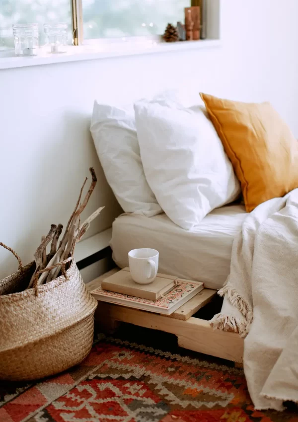 bed with basket and side table