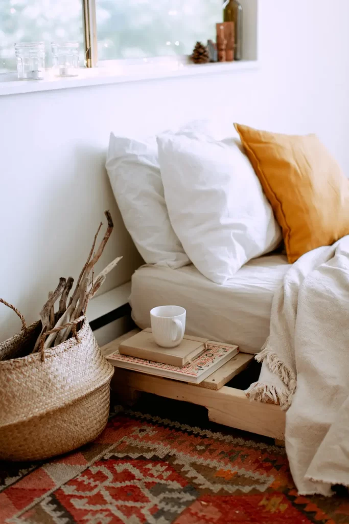 bed with basket and side table