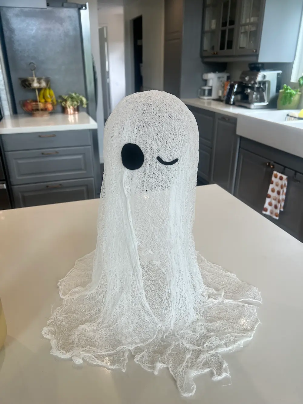 How to make a DIY cheesecloth ghost home sweet apartment