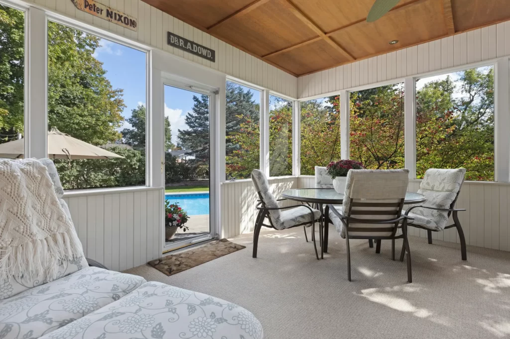 sunroom with pool in background