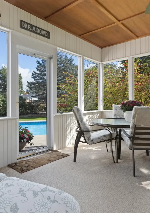 sunroom with pool in background