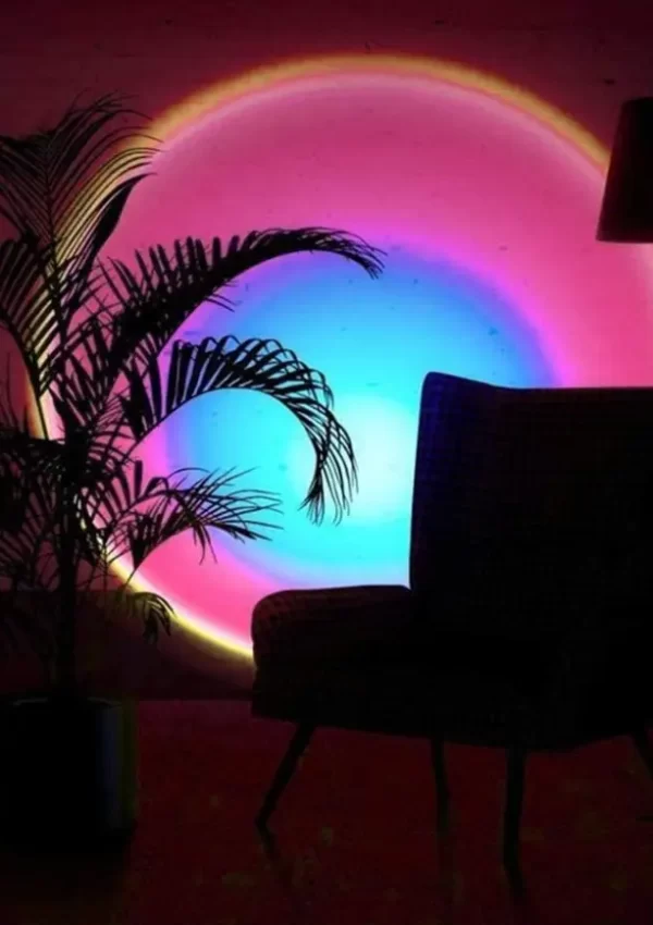 sunset projector lamp shown on wall in darkened room